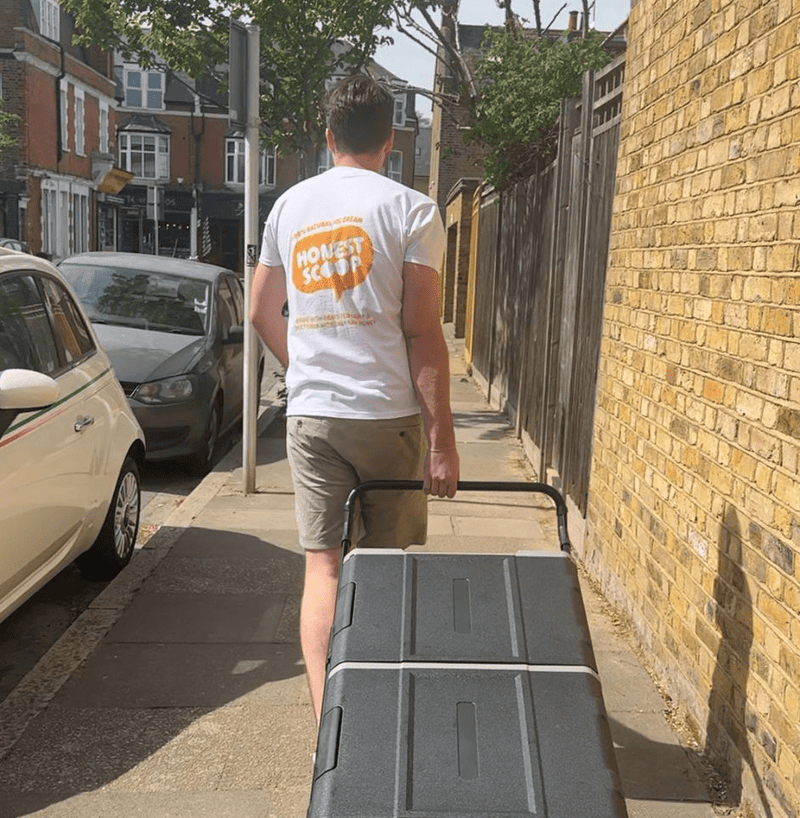 James, Founder pulling portable freezer